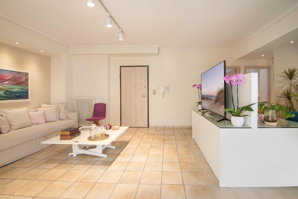 TV a/nebo společenská místnost v ubytování Vicky's Sky Loft