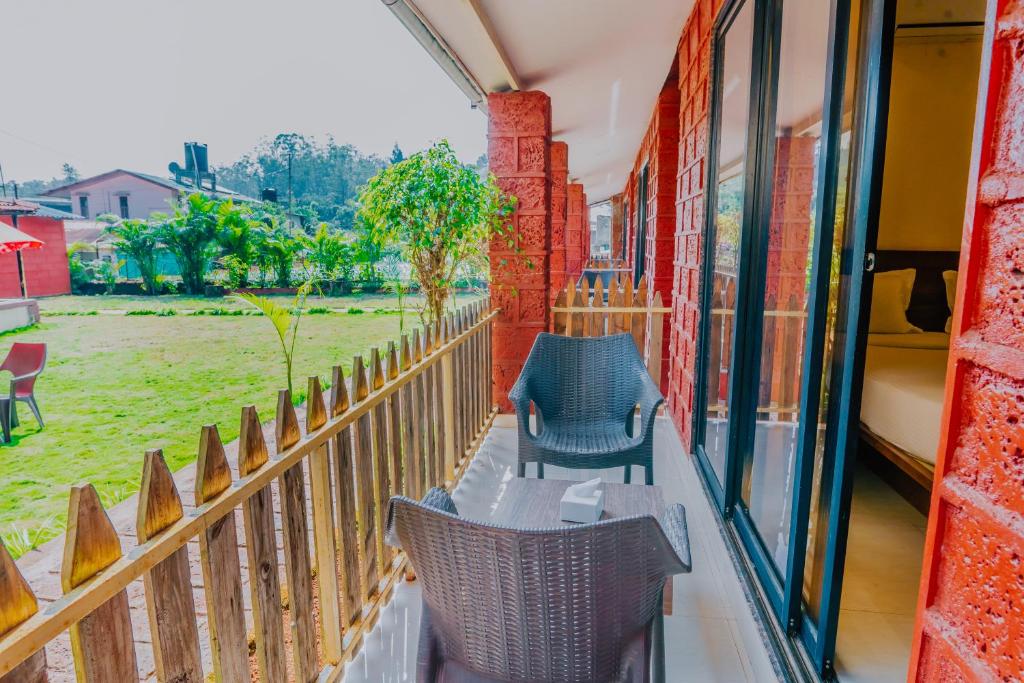 Balkón nebo terasa v ubytování Hotel Oakwood mahabaleshwar