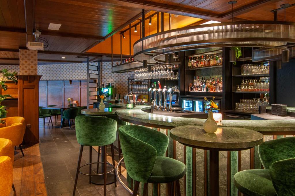 Lounge nebo bar v ubytování Van der Valk Hotel Hengelo
