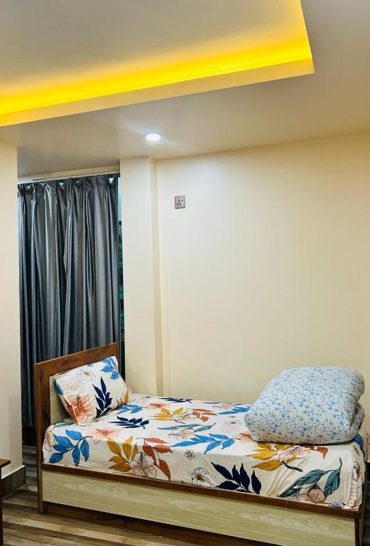 Postel nebo postele na pokoji v ubytování Hotel Balgopal