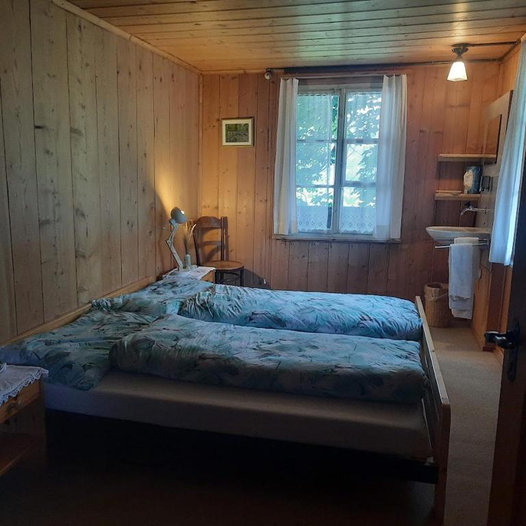 Postel nebo postele na pokoji v ubytování Berggasthaus Obbort