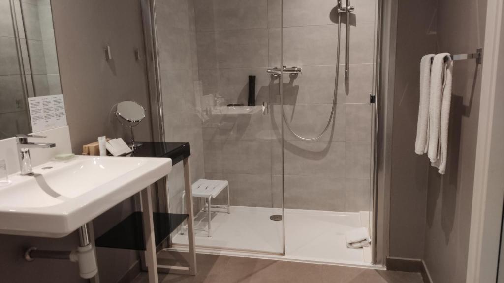 Koupelna v ubytování Grums Hotel & Spa