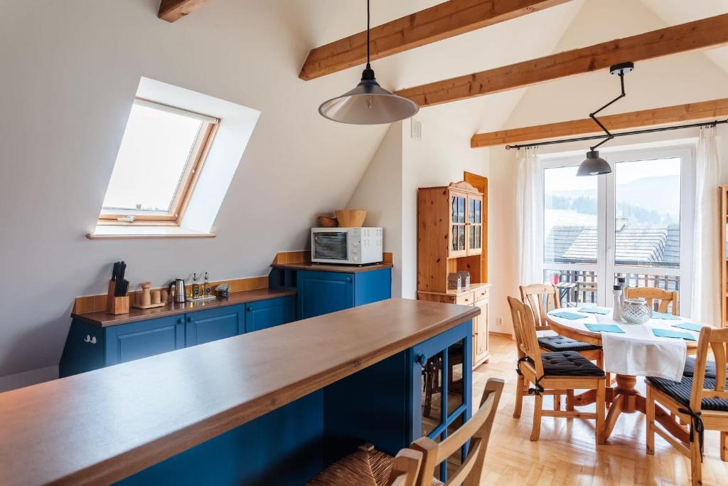 Kuchyňa alebo kuchynka v ubytovaní Rent like home - Oberconiówka