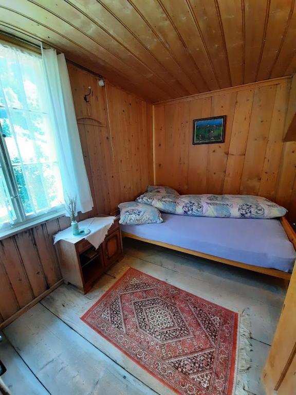 Postel nebo postele na pokoji v ubytování Berggasthaus Obbort
