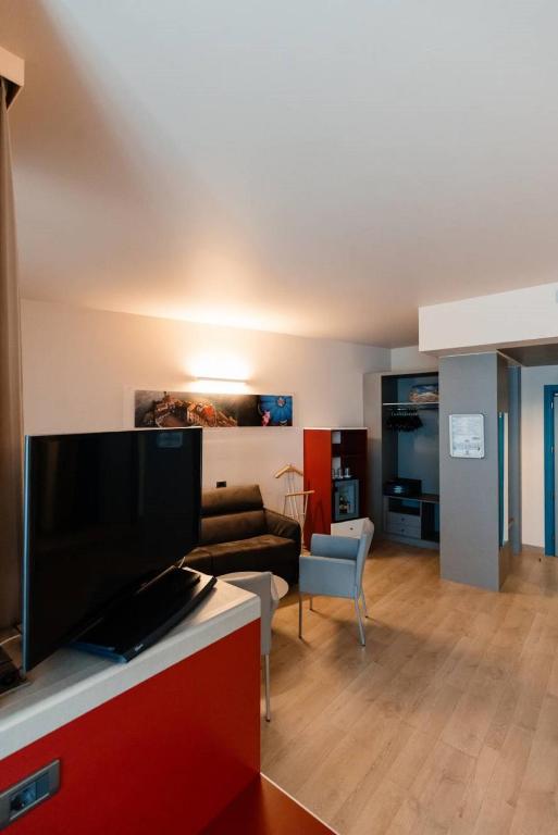 TV a/nebo společenská místnost v ubytování Hotel Ristorante I Castelli