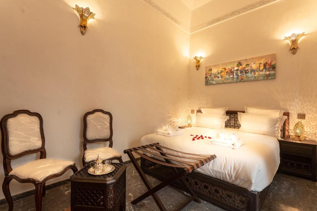 Postel nebo postele na pokoji v ubytování Palais Aix Kabaj &Spa