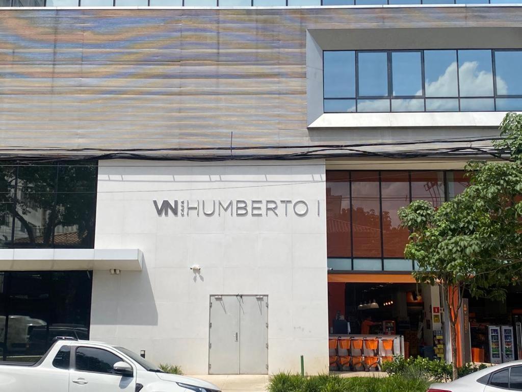 a white building with the word winutherfordo on it at Studio Vl Mariana-ao lado Facul ESPM in Sao Paulo