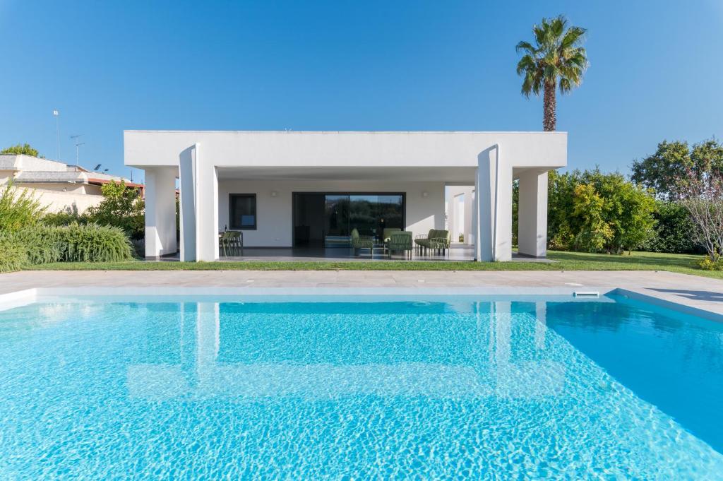 Πισίνα στο ή κοντά στο malolù luxury villa