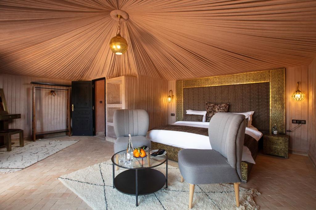 Postel nebo postele na pokoji v ubytování Kalyptus Luxury Camp