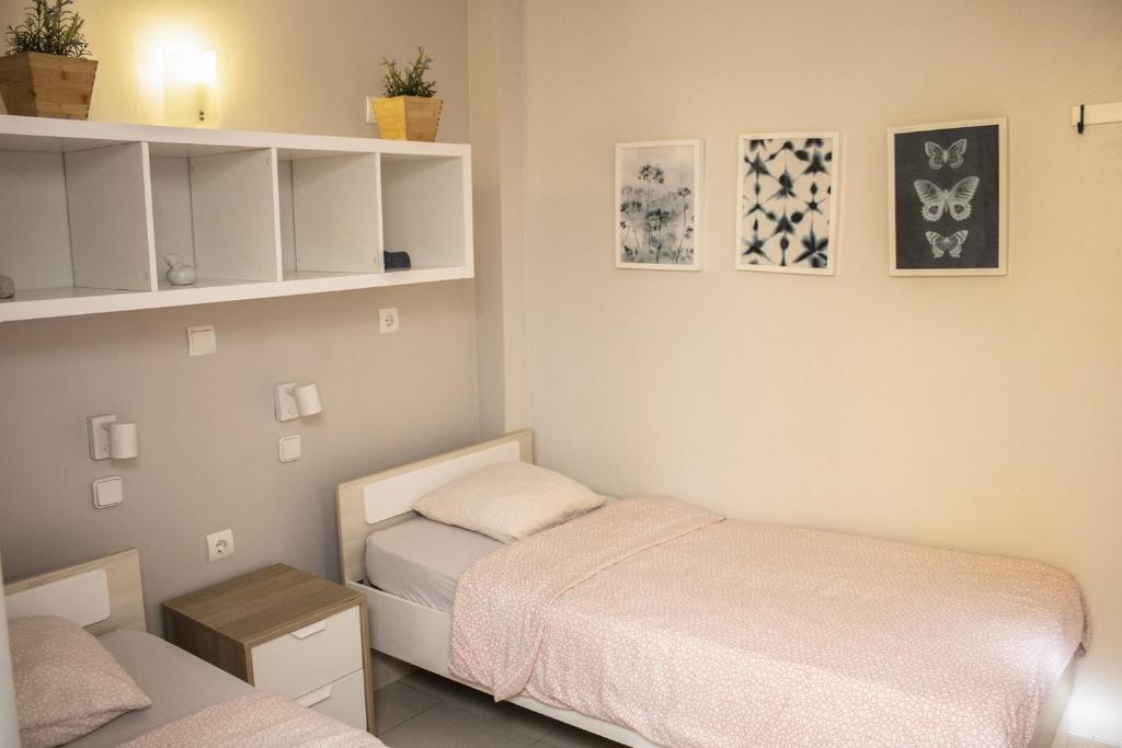Posteľ alebo postele v izbe v ubytovaní Onefam Sants