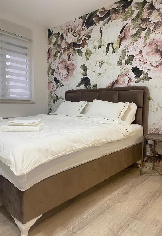Voodi või voodid majutusasutuse Apartman Enigma toas