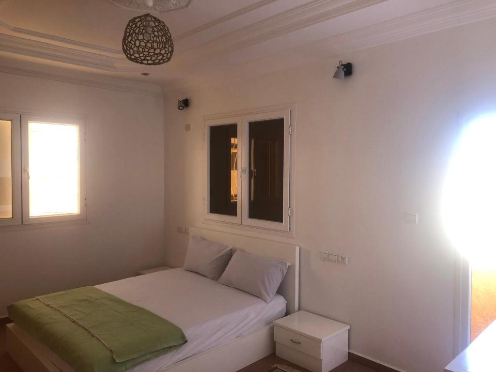 Ένα ή περισσότερα κρεβάτια σε δωμάτιο στο Dania surf house appartement