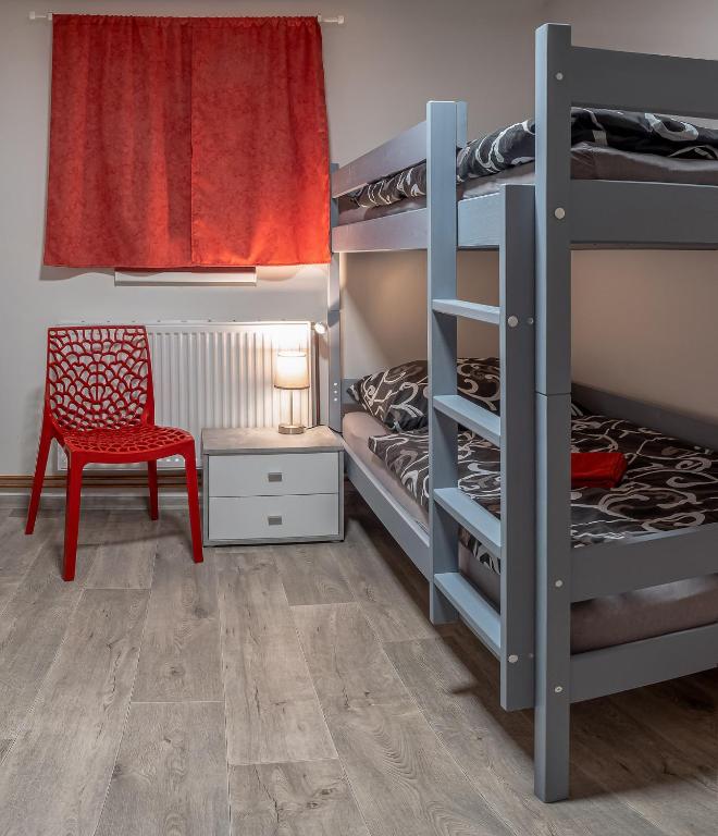 Postel nebo postele na pokoji v ubytování Domeček Janov