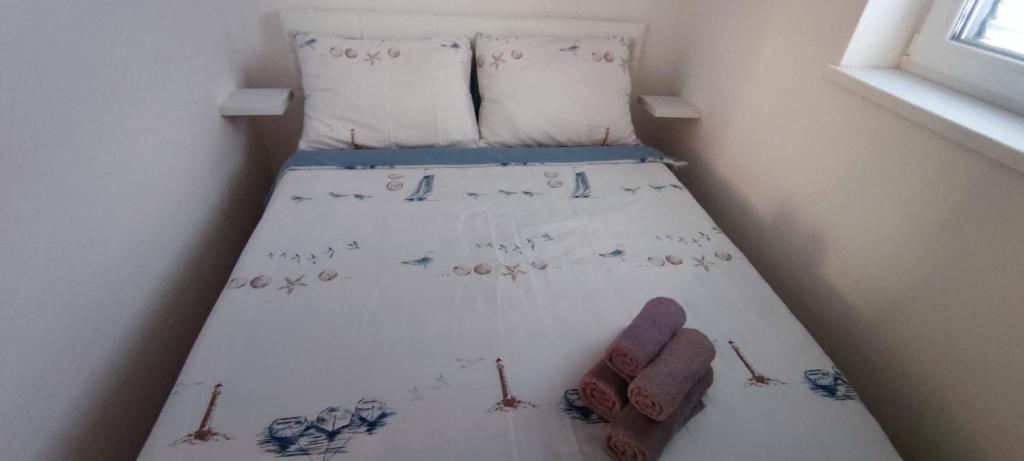 Posteľ alebo postele v izbe v ubytovaní Apartman Mirjana