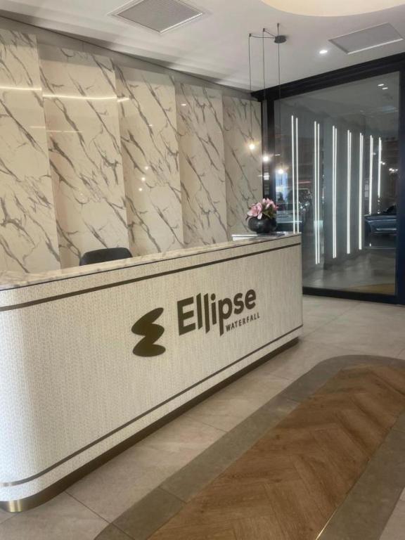 a lobby with a reception desk in a building at Executive Suite at Ellipse in Waterfall Midrand in Midrand