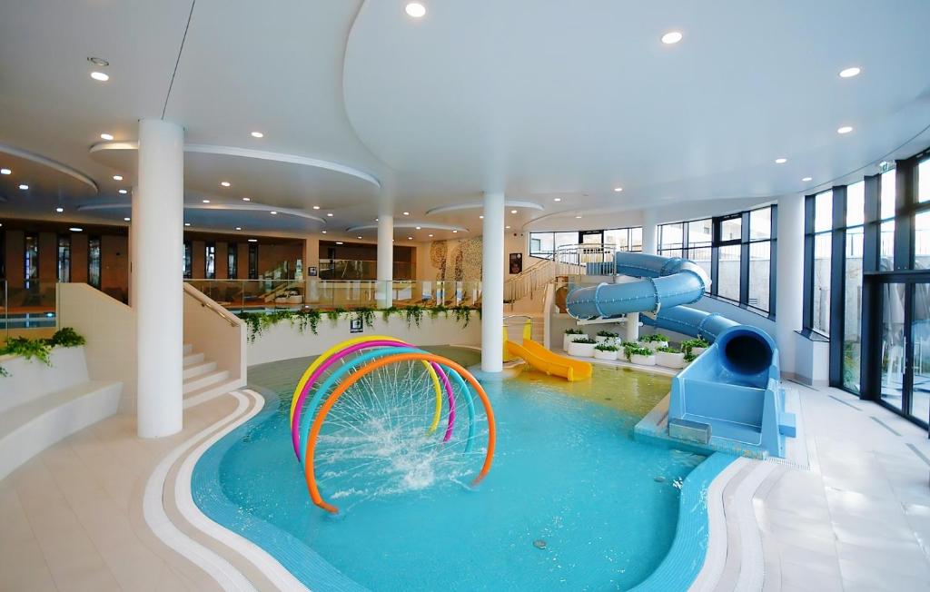 Bazén v ubytovaní Apartament Lux I , Kołobrzeg Aqua Polanki , Baseny , Sauny , Siłownia alebo v jeho blízkosti