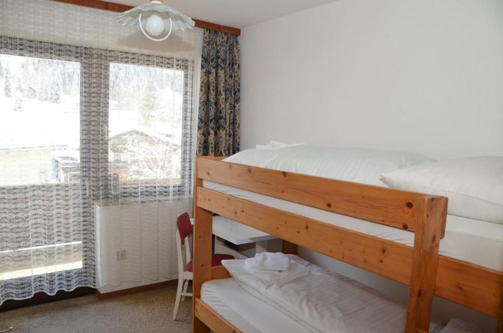Postel nebo postele na pokoji v ubytování Haus Grader