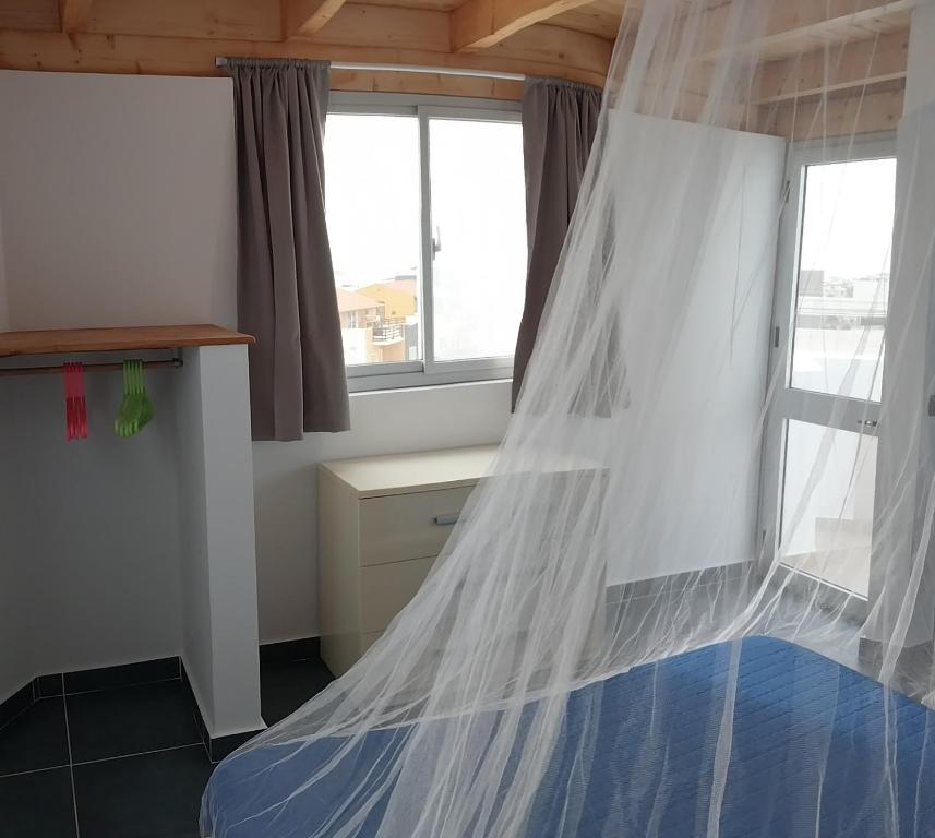 Postel nebo postele na pokoji v ubytování Cala da Lua apartments