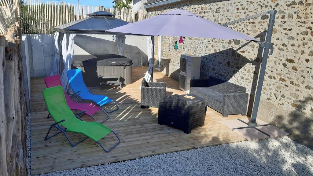 Patio nebo venkovní prostory v ubytování Superbe Gîte bord de mer avec jacuzzi 6 personnes