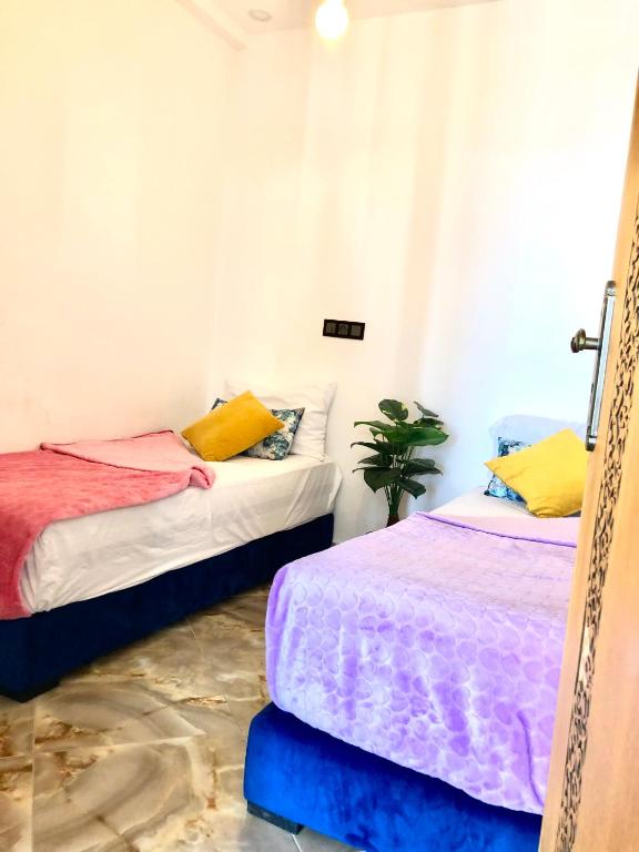 Postel nebo postele na pokoji v ubytování Padova Surf House