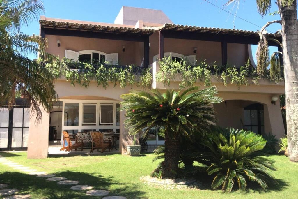 Κήπος έξω από το Um sonho de casa frente à laguna