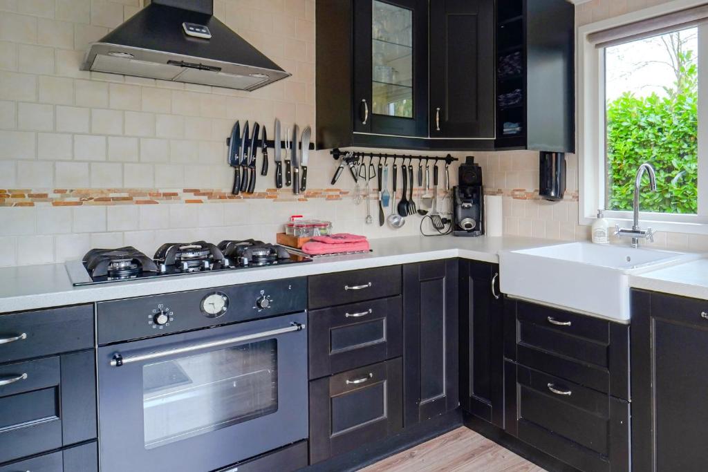 Kuchyň nebo kuchyňský kout v ubytování Better together - luxe chalet met houtkachel