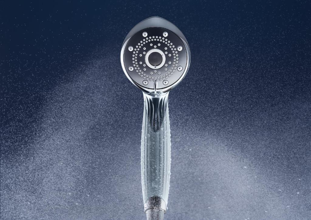 a shower head with water coming out of it at Richmond Hotel Yokohama-Bashamichi in Yokohama