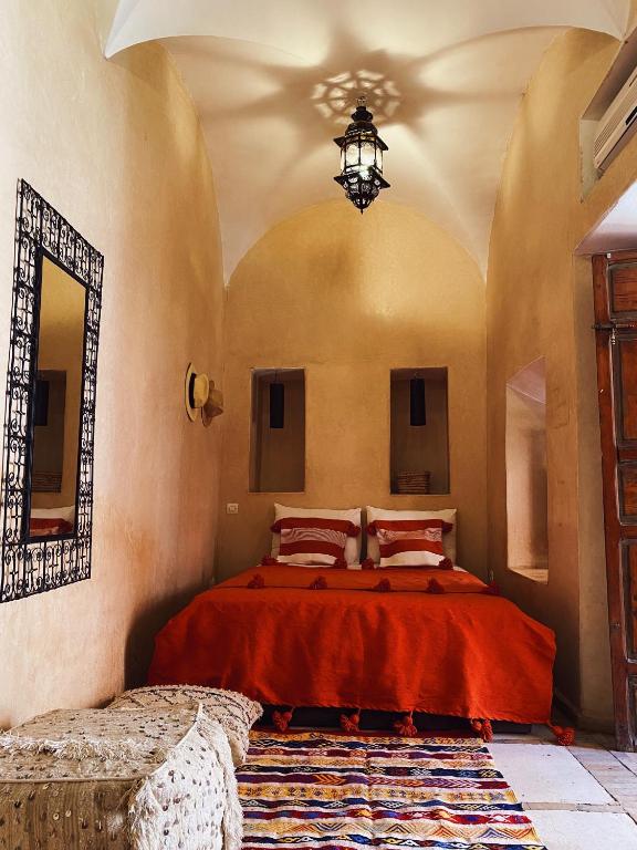 Postel nebo postele na pokoji v ubytování Riad Sidi Radoine