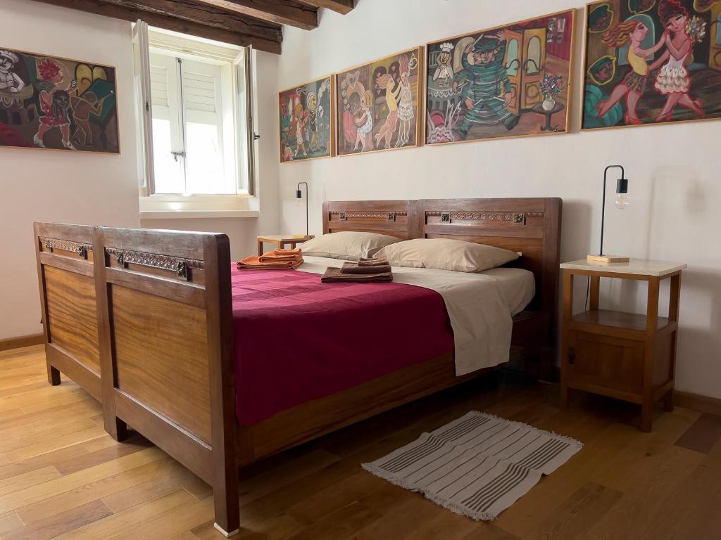 En eller flere senger på et rom på Art apartment Alla casa del Gastaldo