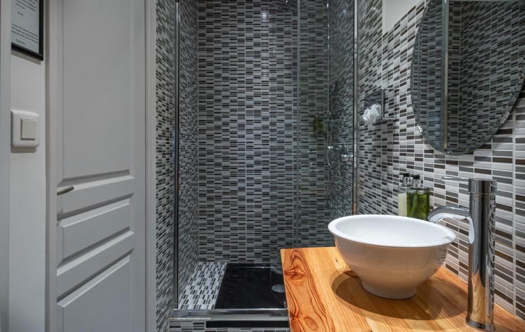 Koupelna v ubytování Le Nouvel Hôtel