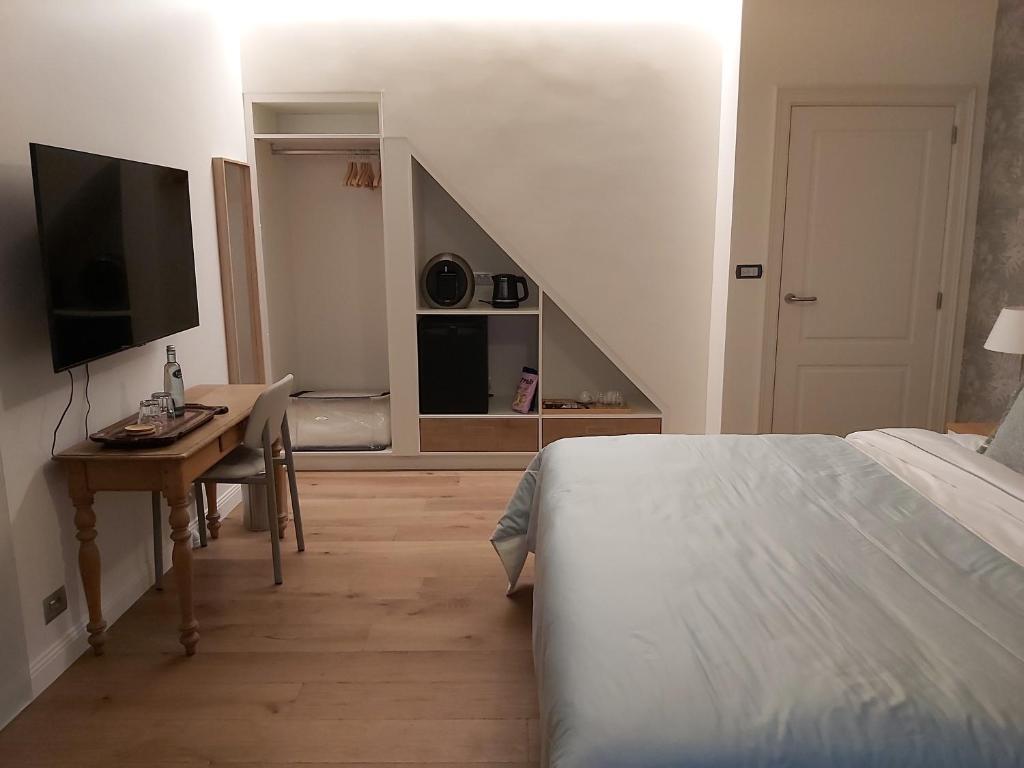 TV a/nebo společenská místnost v ubytování B&B Asmara
