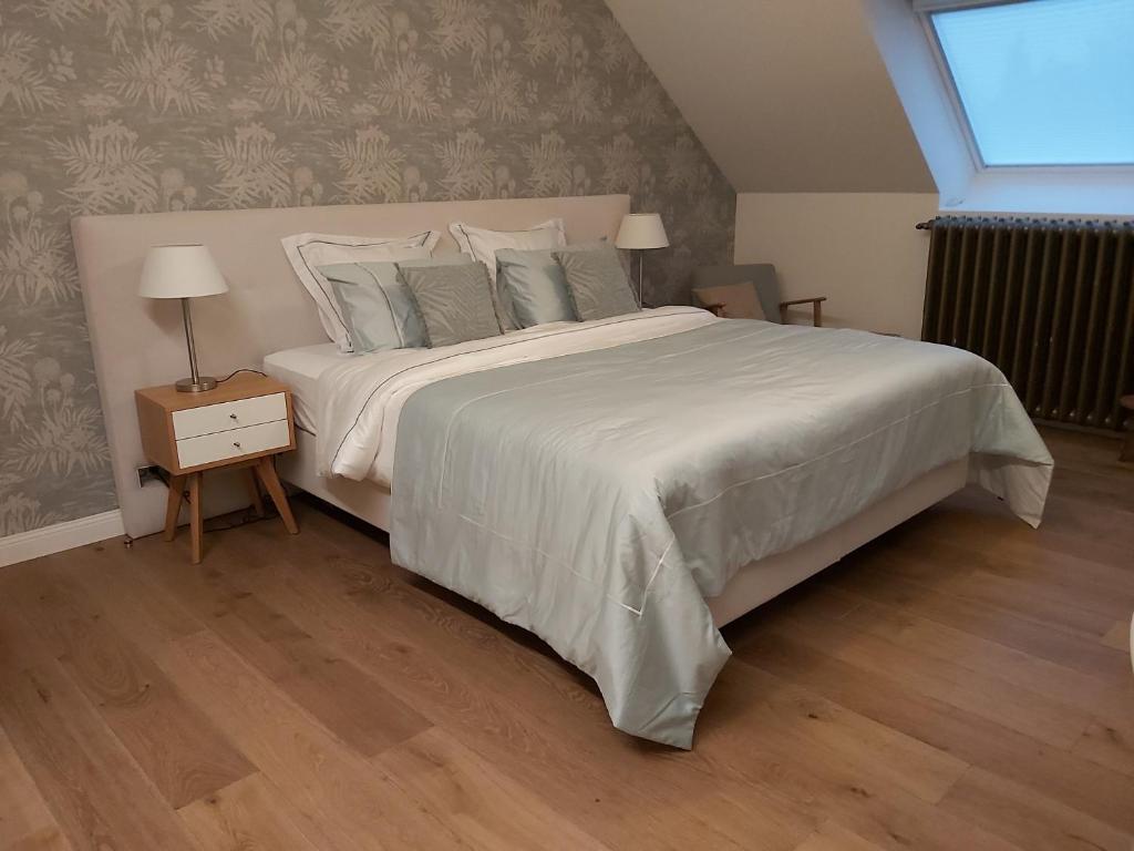 Postel nebo postele na pokoji v ubytování B&B Asmara