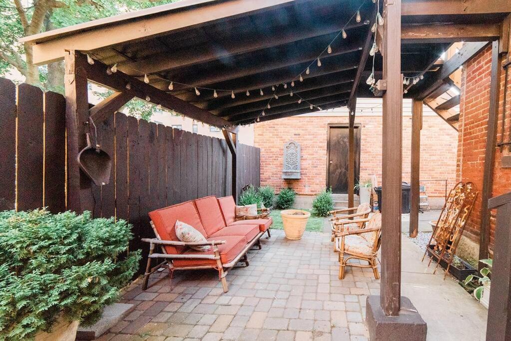 a patio with a couch and chairs under a pergola at Outdoor Space - Parking - 1st Floor - Walkable in Pittsburgh