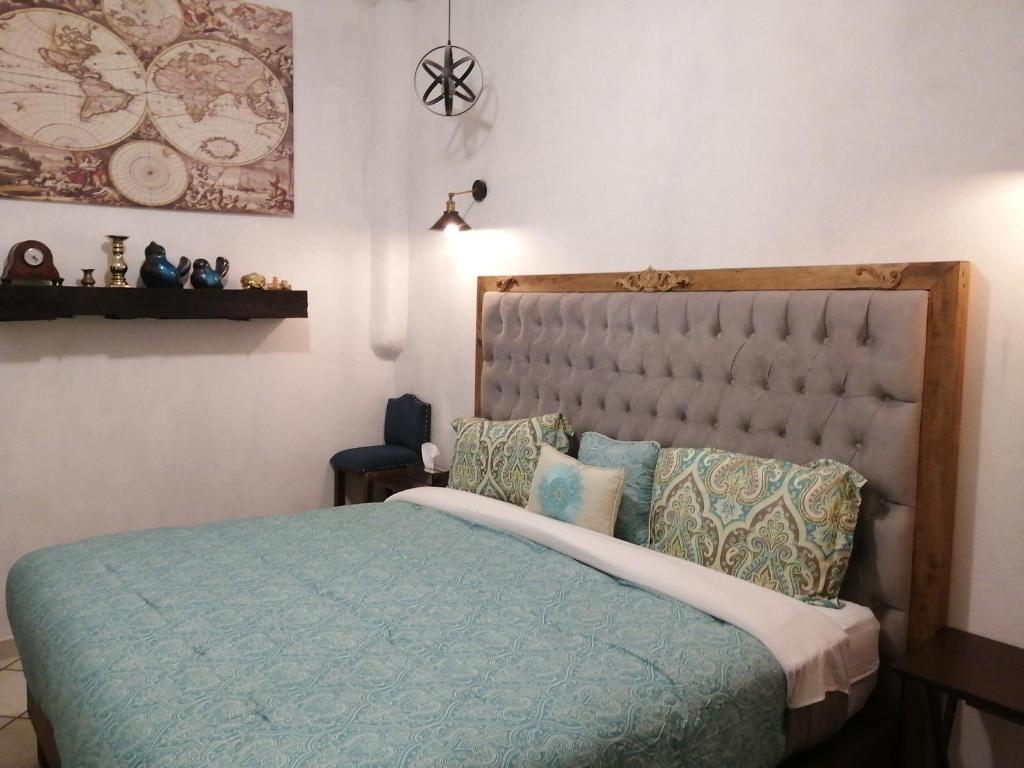 Postel nebo postele na pokoji v ubytování Villas del Sol
