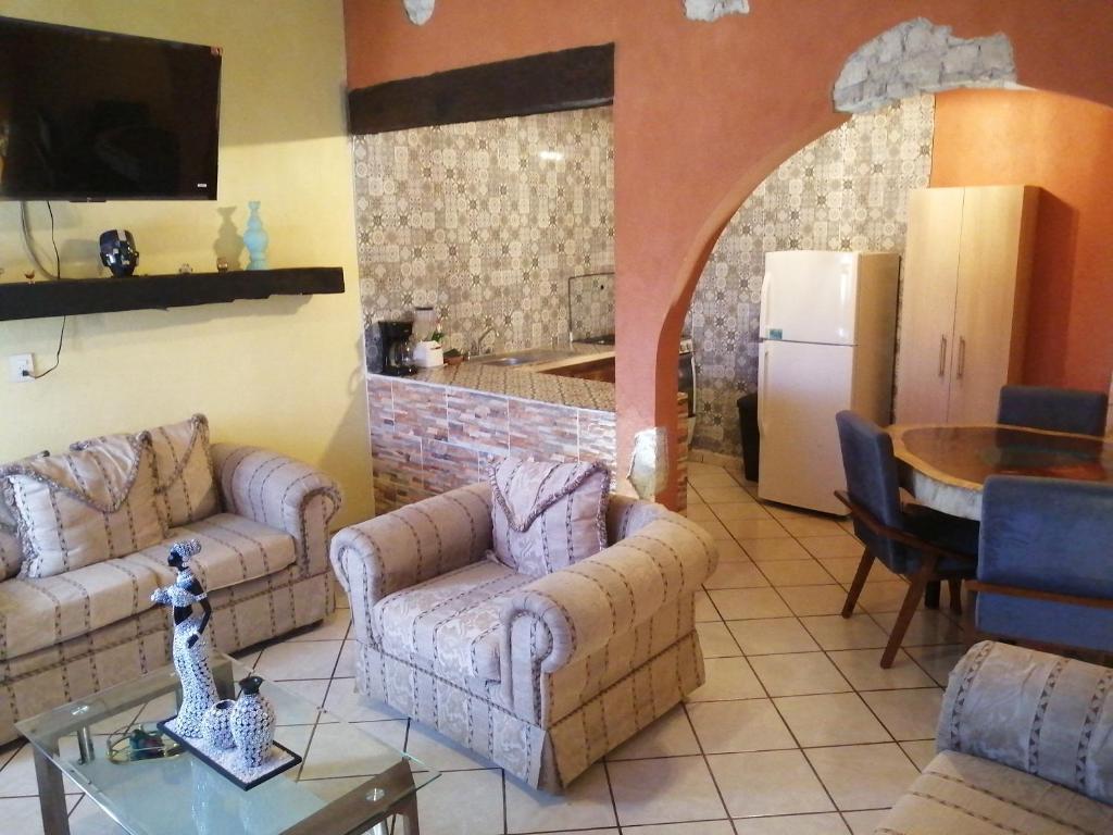 Kuchyň nebo kuchyňský kout v ubytování Villas del Sol