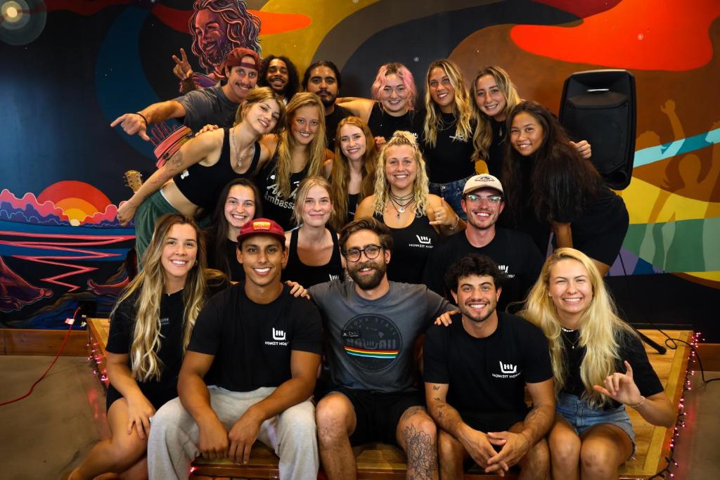 a group of people posing for a picture at Howzit Hostels in Wailuku