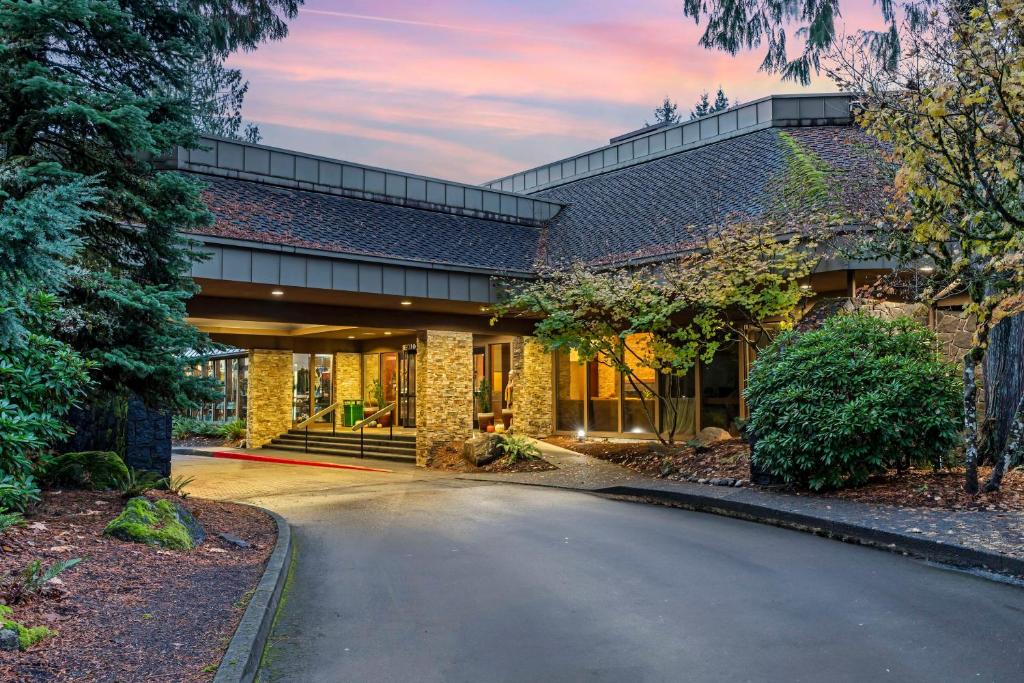 an empty road in front of a house at BW Premier Collection, Mt Hood Oregon Resort in Welches