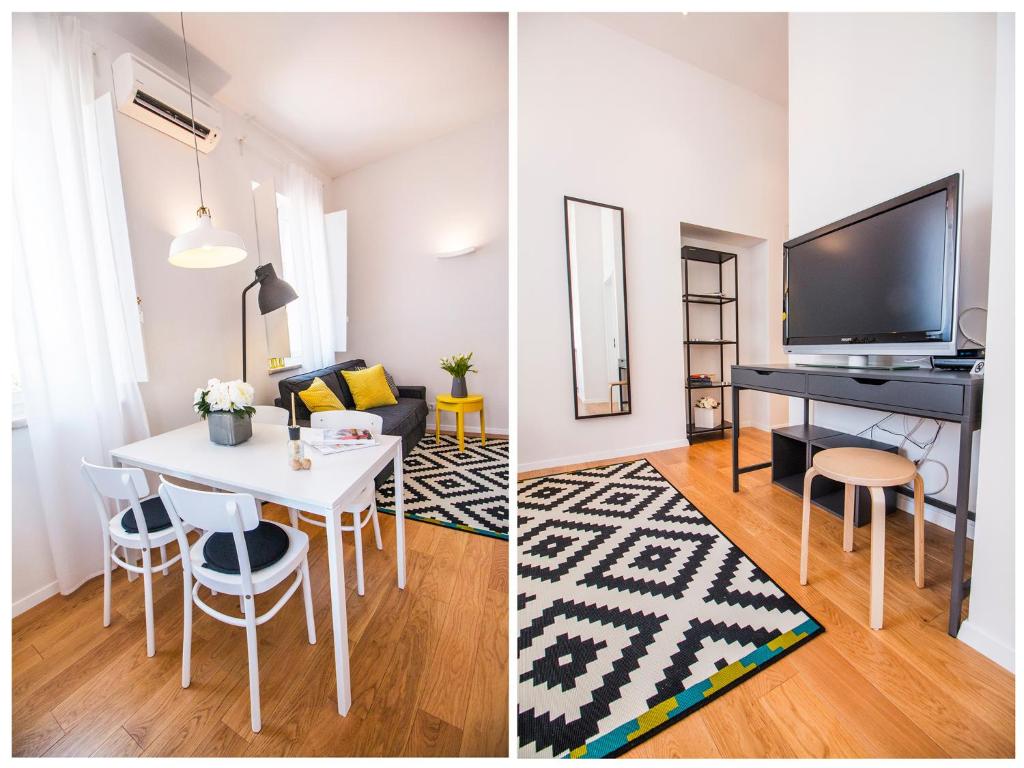 Televízia a/alebo spoločenská miestnosť v ubytovaní Furioso Apartments