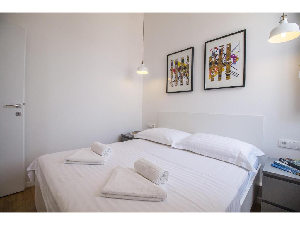 Posteľ alebo postele v izbe v ubytovaní Furioso Apartments
