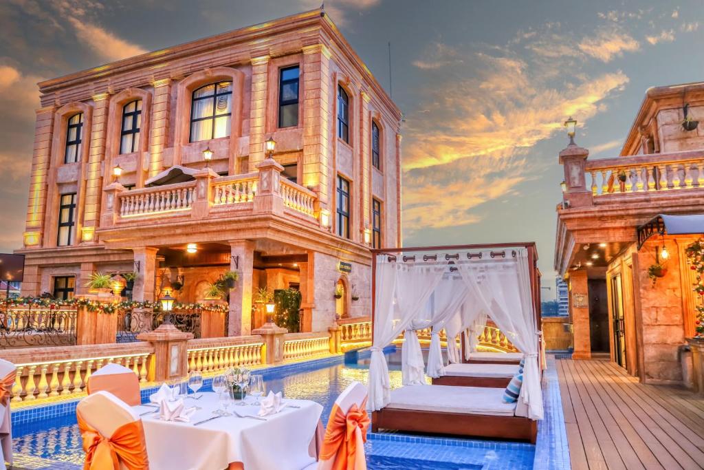 an outdoor wedding set up in front of a mansion at Anik Palace Hotel in Phnom Penh