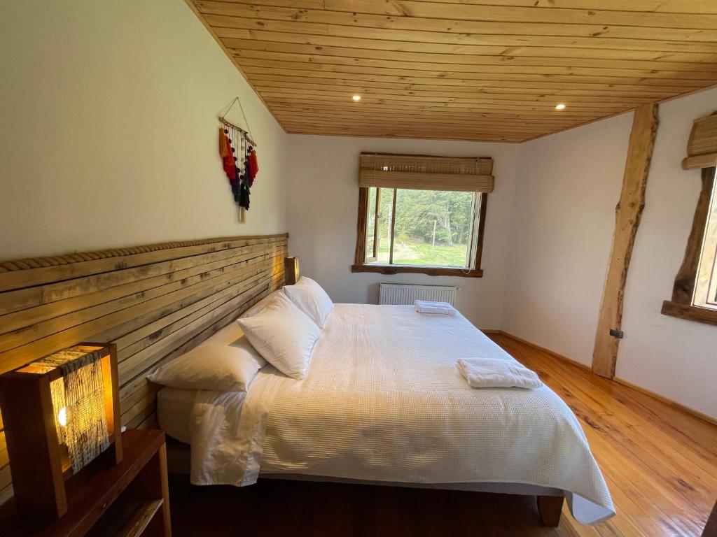 Postel nebo postele na pokoji v ubytování Pu Am Eco Lodge