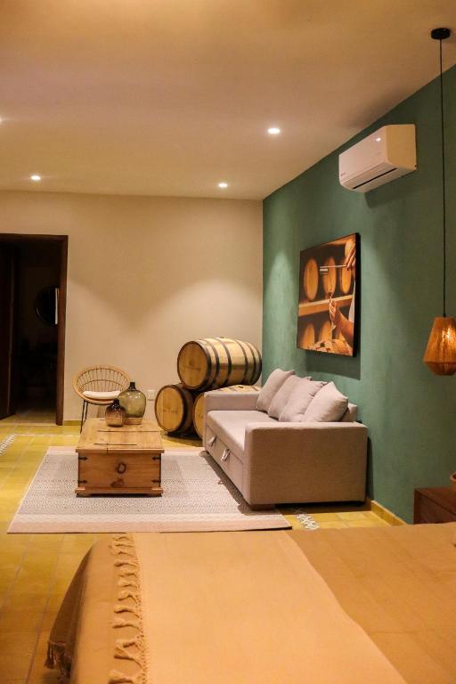 Postel nebo postele na pokoji v ubytování Hotel Boutique Gloriagave