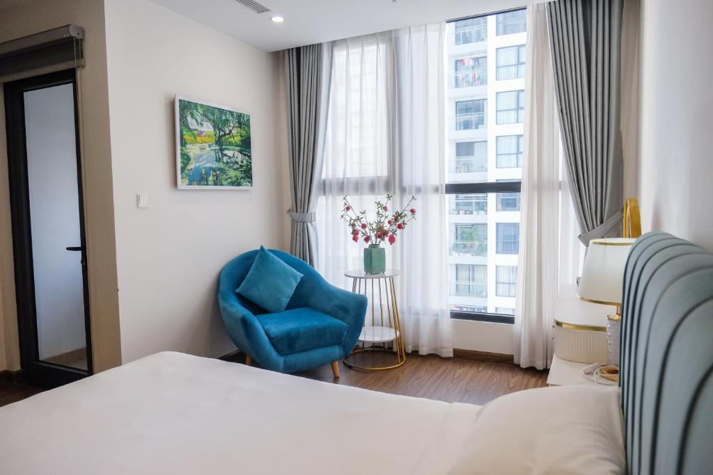 Letto o letti in una camera di Aspaces Serviced Apartments - Vinhomes West Point