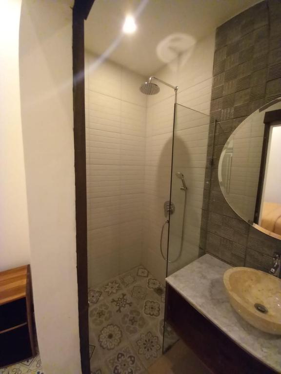 Koupelna v ubytování Rumah WJ rooms and suites