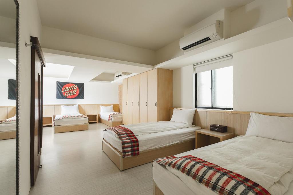 Postel nebo postele na pokoji v ubytování Tropical Low Boundary B&B