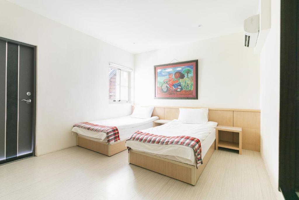 Postel nebo postele na pokoji v ubytování Tropical Low Boundary B&B