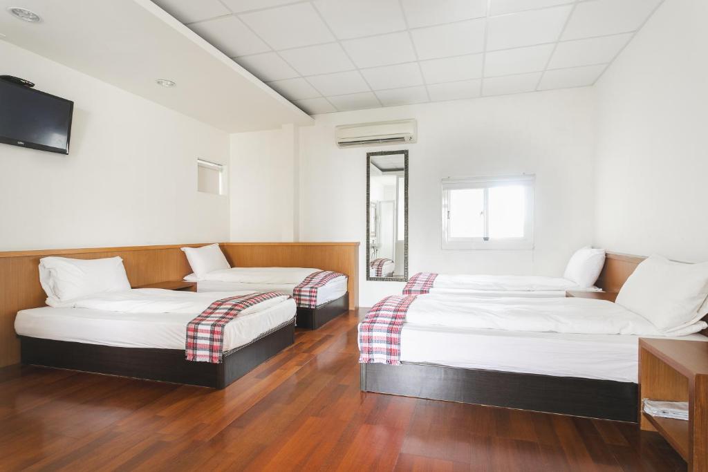 Postel nebo postele na pokoji v ubytování Tropical Low Boundary B&B
