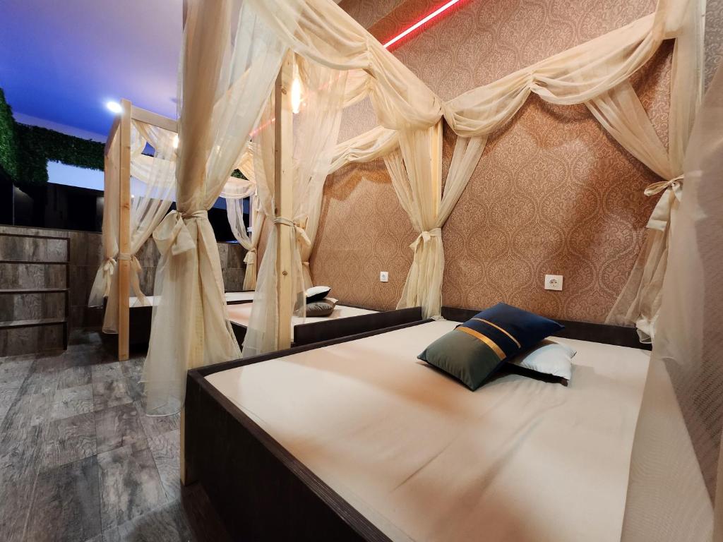 Postel nebo postele na pokoji v ubytování Hotel Central Point