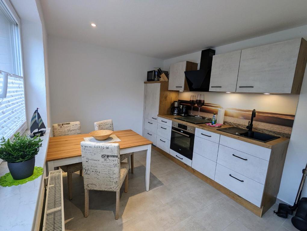 Kuchyň nebo kuchyňský kout v ubytování Ferienhaus Sellin