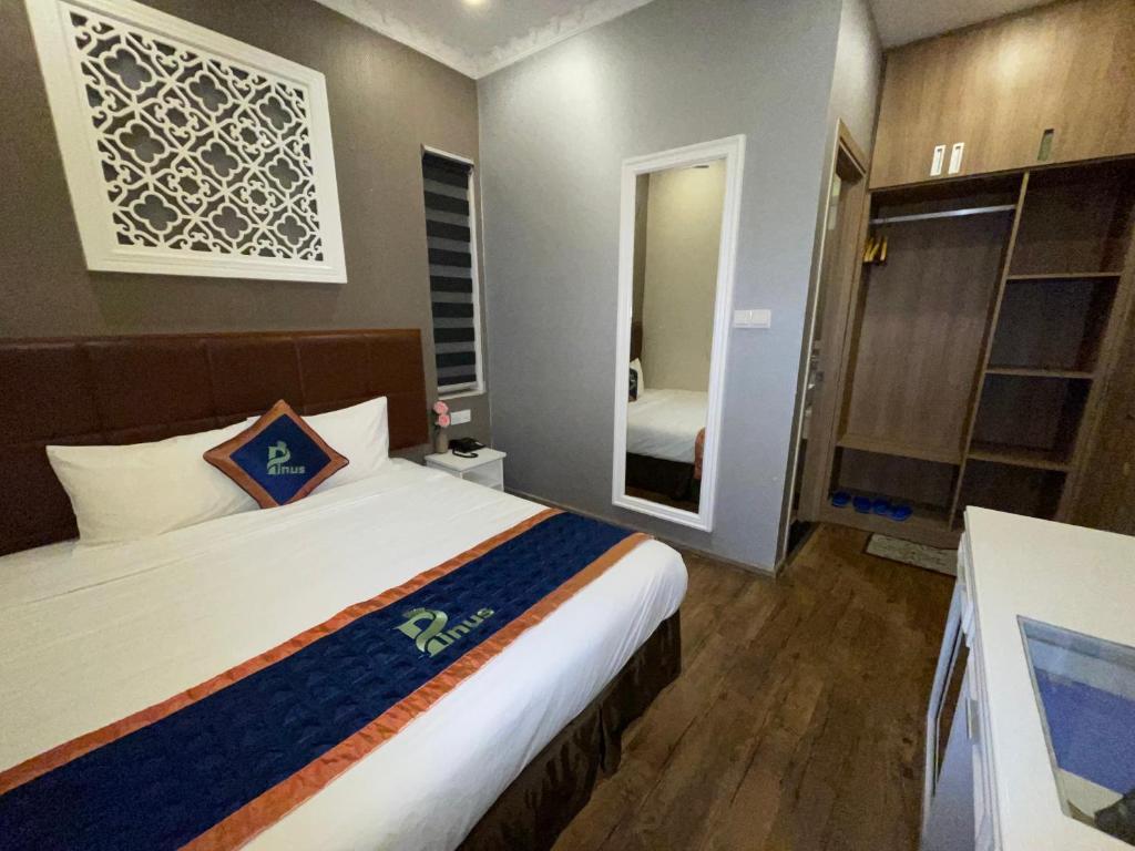 Postel nebo postele na pokoji v ubytování Pinus Hotel